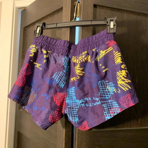 Under Armour heat gear shorts (Purple background, pink, yellow & blue print). - Picture 4 of 4